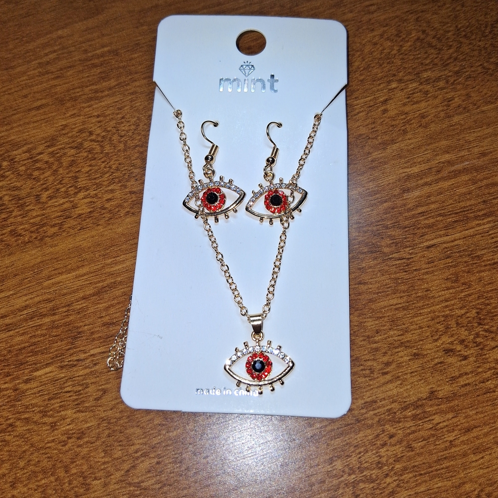 Mint Gold Tone and Red Eye Earrings